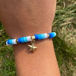 A handmade clay bead bracelet